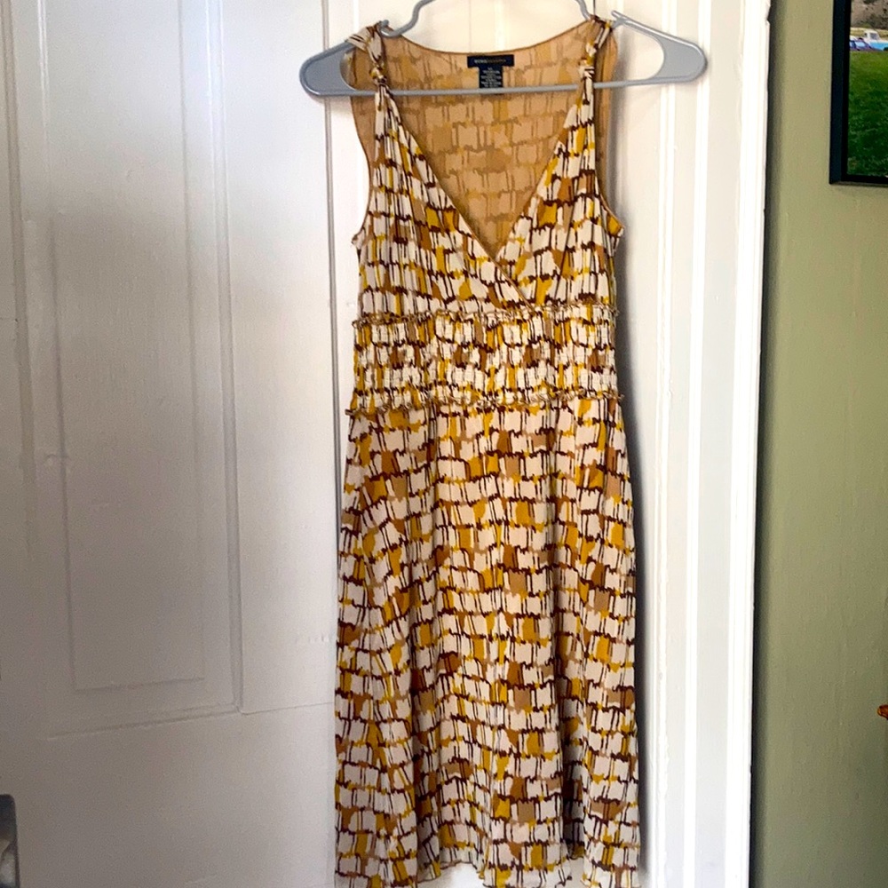 Sleeveless earth toned dress from BCBG